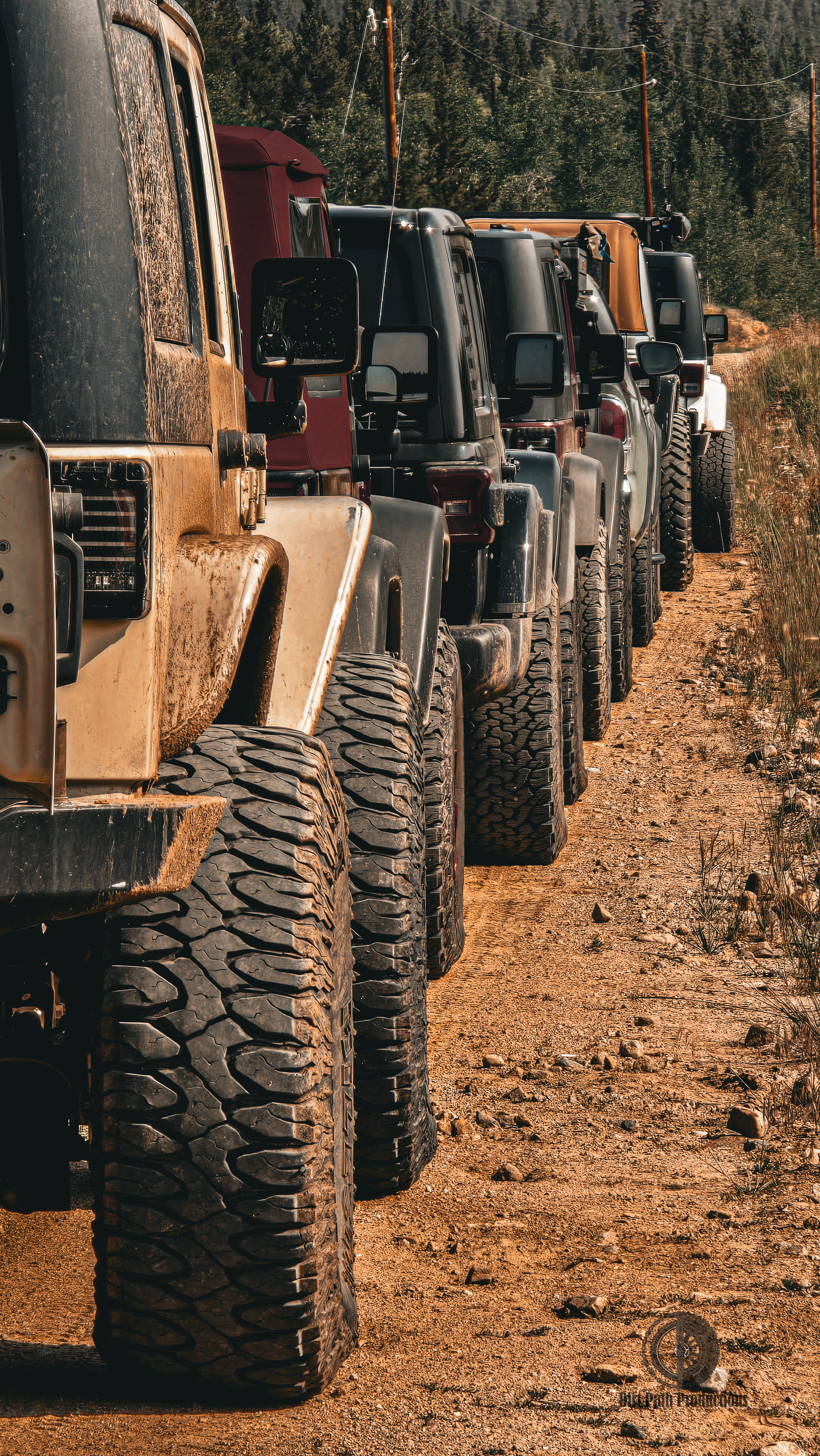 4x4 vehicle conquering rocky trail